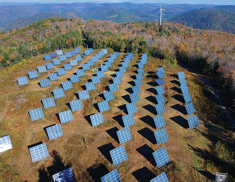 Berkshire East’s 10-acre solar field and wind turbine. Photo courtesy of New England Drone Productions