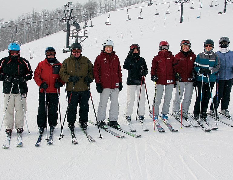 Retired Not Tired founder Rick Robb, fourth from left, leads a class.